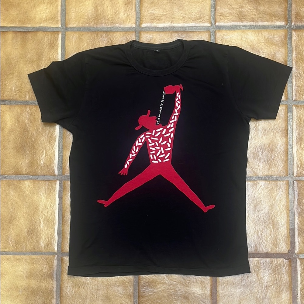 MIKKELLER Black T-Shirt with Red Graphic